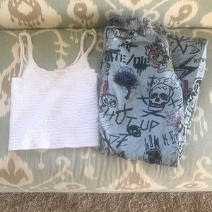 Cute outfit with graffiti pants and white crop top.